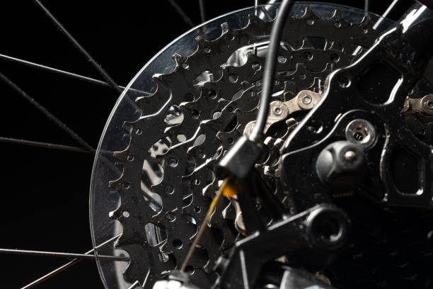 istock New bicycle chain part close up on black background 1997001368