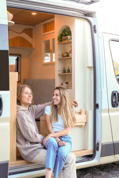 istock Young Couple Relaxing and having fun while roadtripping 1997020184