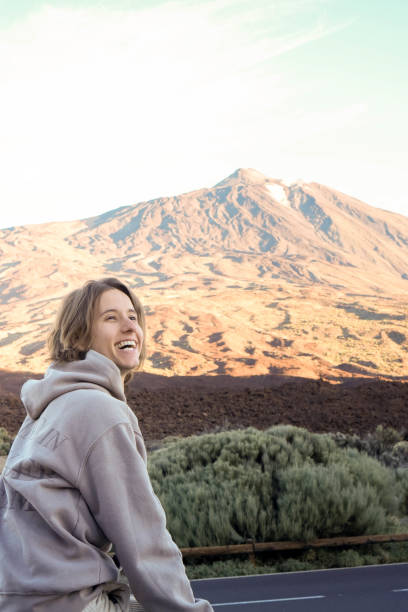 istock Smiling young man With View of Teide Mountain at Sunset 1997035956