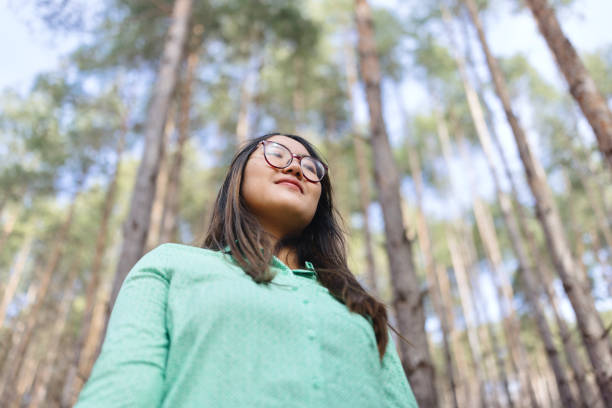 istock Multiracial woman enjoying nature 1997054846
