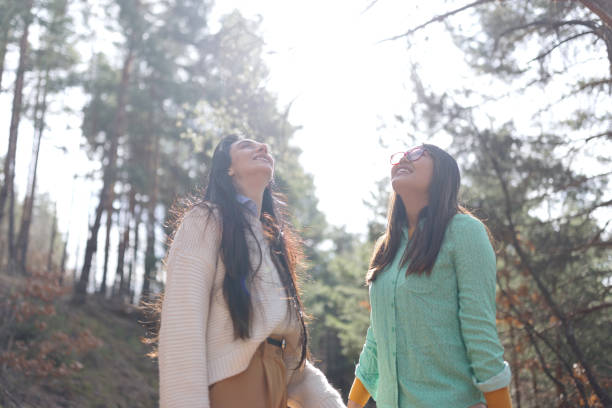 Multiracial people relaxing in the forest