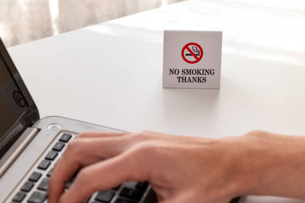 istock Working on a computer in a non-smoking area in the office 1997075407