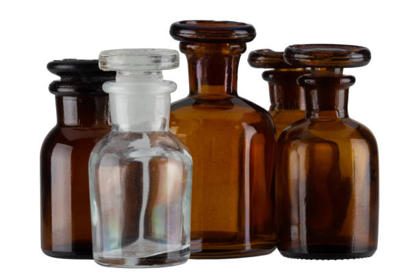 Retro vintage apothecary glass bottles isolated on white background