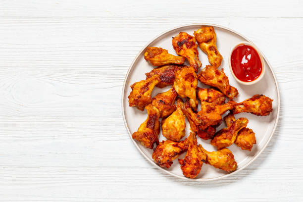 istock spicy crispy grilled chicken wings, top view 1997082848