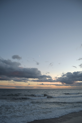 Clouds in a beach at sunset