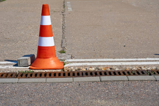 istock A traffic orange cone is used as a barrier during road construction work 1997191535