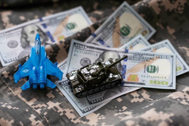 istock model military fighters and dollars 1997227921