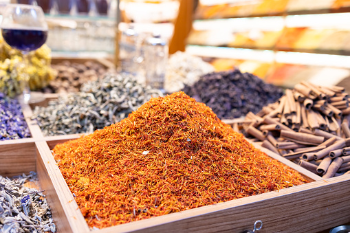 Close-up, colorful spices and sweets in the bazaar in Istanbul. Eastern, traditional, local. Many types of spices ready for sale, pepper varieties. Bazaar for tourists.