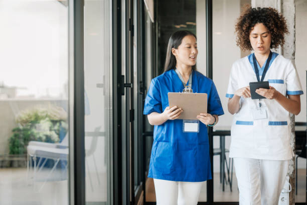 istock Nurses chatting at the hospital 1997259321