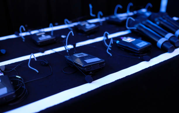 istock Clip-on microphones ready in the backstage area 1997285654