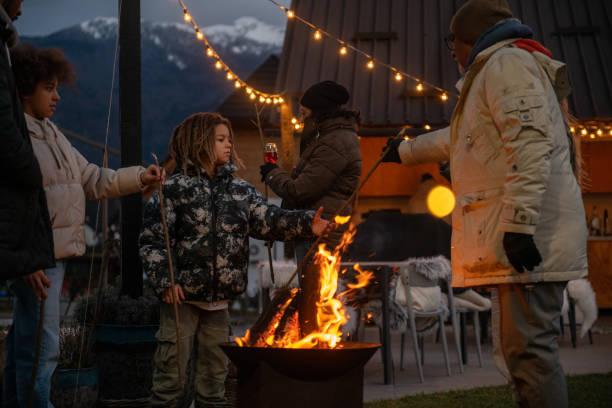 istock Family enjoying the outdoors fireplace 1997307836