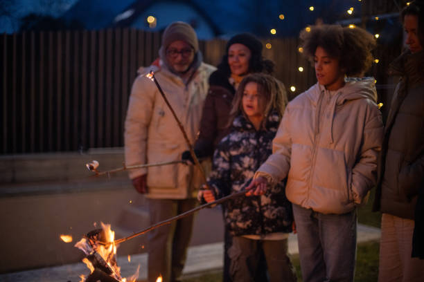 istock Family enjoying the outdoors fireplace 1997312046