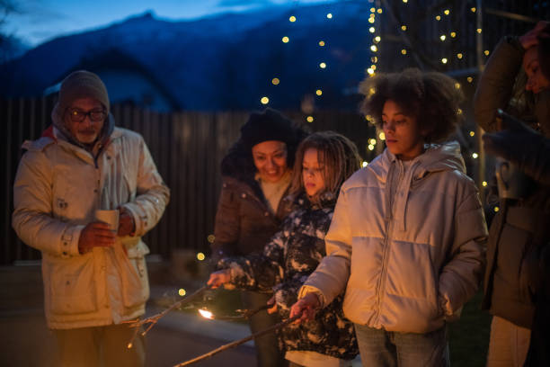 istock Family enjoying the outdoors fireplace 1997313118