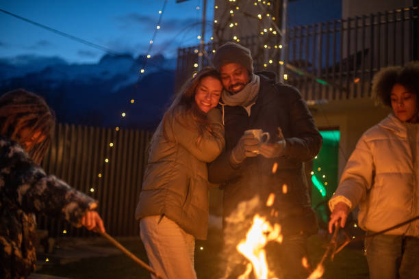 istock Couple enjoying the outdoors fireplace 1997314695