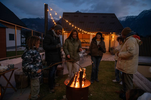 istock Family enjoying the outdoors fireplace 1997318439