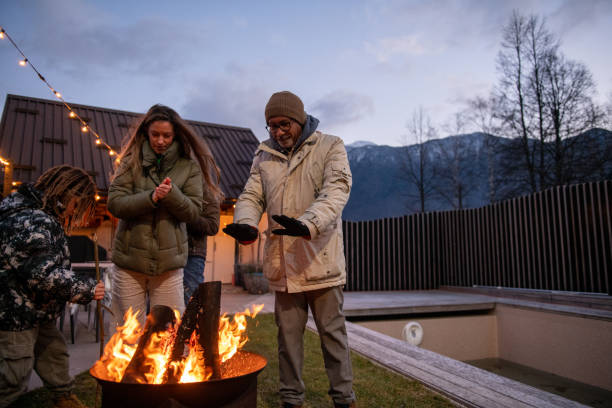 istock Family enjoying the outdoors fireplace 1997320581