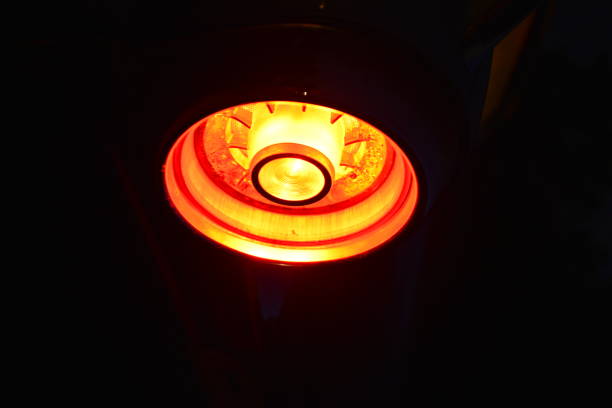istock Close-up of a lamp on black background 1997334231