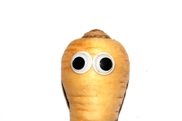 istock Silly Food Parsnip with Goggly Wobbly Eyes on them 1997334751