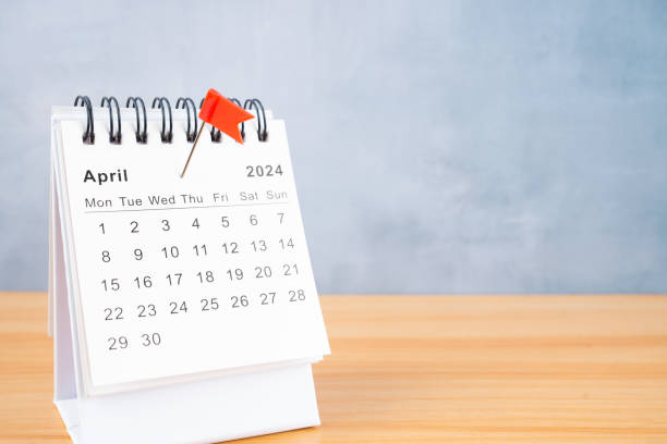 istock April 2024 calendar and red push pin. 1997343833
