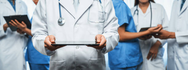 istock Confident medical staff team in panoramic banner. Neoteric 1997348035