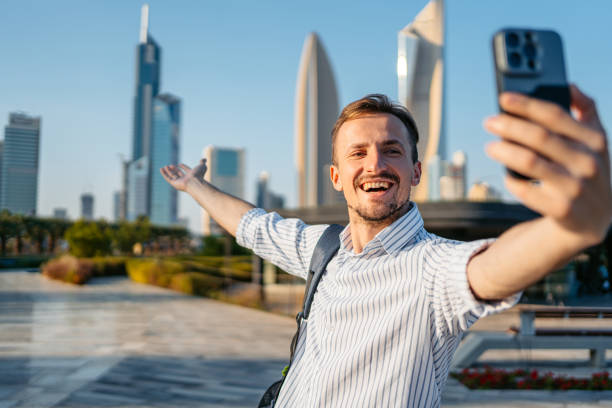 istock Young Man Taking Selfies In The Al Shaheed Park In Kuwait City 1997381768