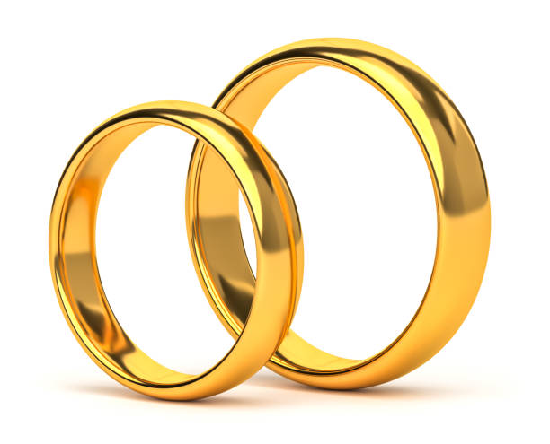 istock Two wedding gold rings isolated on white. Unity, love concept 1997390132