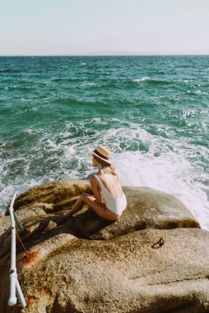 istock Solo traveler by the sea 1997424008