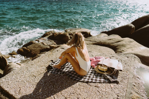 istock Solo traveler by the sea 1997424534