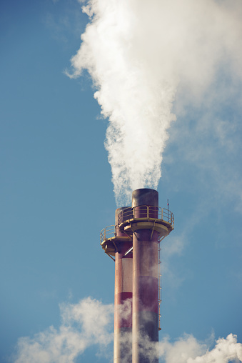 Smokestacks in a paper mill, Zaragoza Province, Spain.