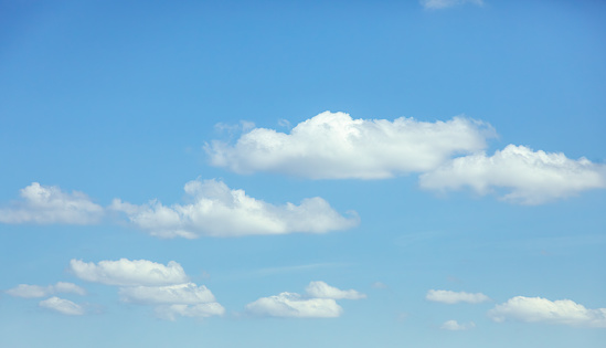 Blue sky background with white cloud in sunny day. Nature and save environmental concept.