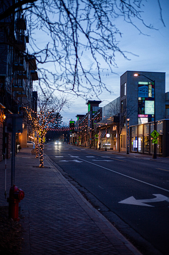 A nighttime city street with vibrant illuminated lights