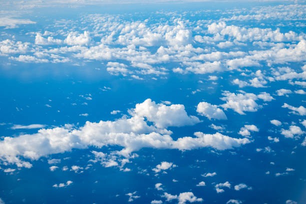 istock Beautiful airplane view above clouds 1997457948