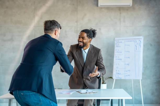 istock Cheerful business partners starting cooperation, getting partnership 1997464957