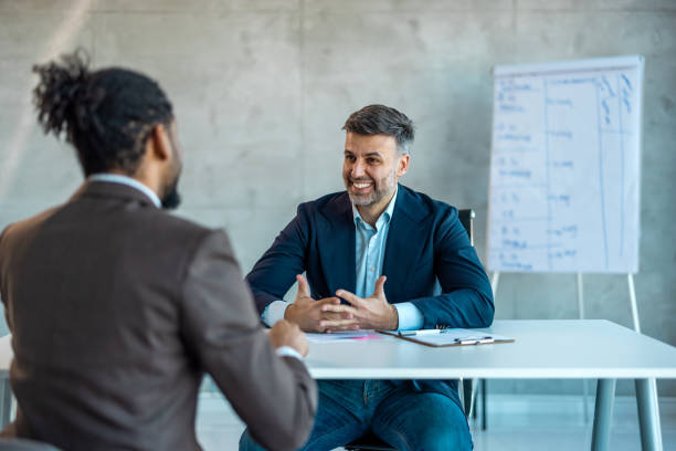 istock Multiethnic business people in meeting 1997464974