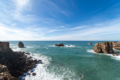 Pontal da Carrapateira, blue sky and sea view from the cliff in Aljezur, Portugal