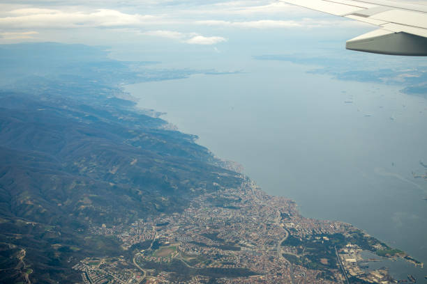 istock Beautiful airplane view above clouds 1997530531