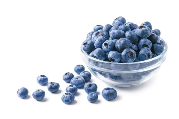 istock Fresh blueberries in a transparent bowl isolated on white background 1997542399