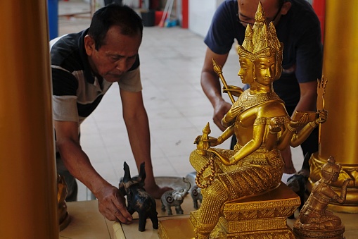 Buddhists clean the monastery to welcome the Chinese New Year, in Banda Aceh City on February 9, 2024.