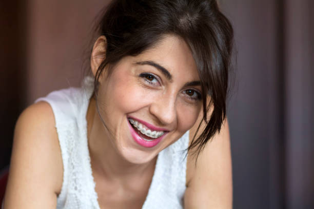 istock Smiling Woman with Dental  Braces 1997578089