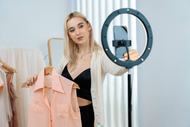 istock Young woman making fashion video content for social media. Blithe 1997589868