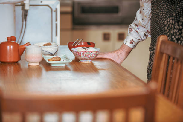 istock Elderly woman eating lonely 1997593044