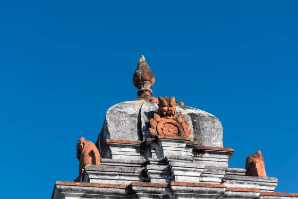 istock Ancient Temple Architecture Against Clear Blue Sky in Shravanabelagola, India 1997624383