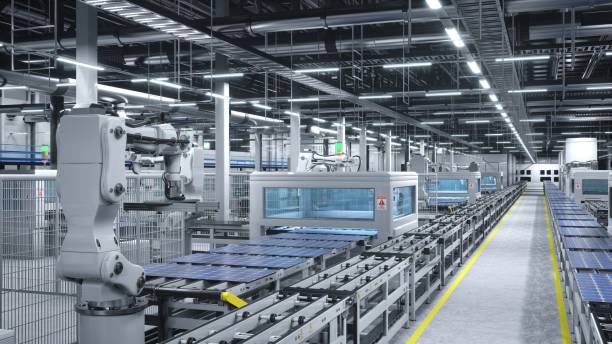 istock Solar panel factory with robotic arms placing solar cells on conveyor belts 1997630228