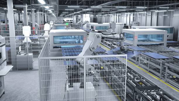 istock Industrial robot arms placing solar panels on large production line 1997637083