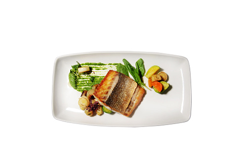 Grilled seabass dish on the serving plate