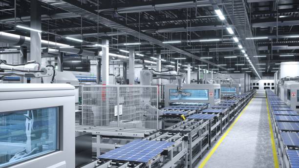 istock Industrial robot arms placing solar panels on large production line 1997658908