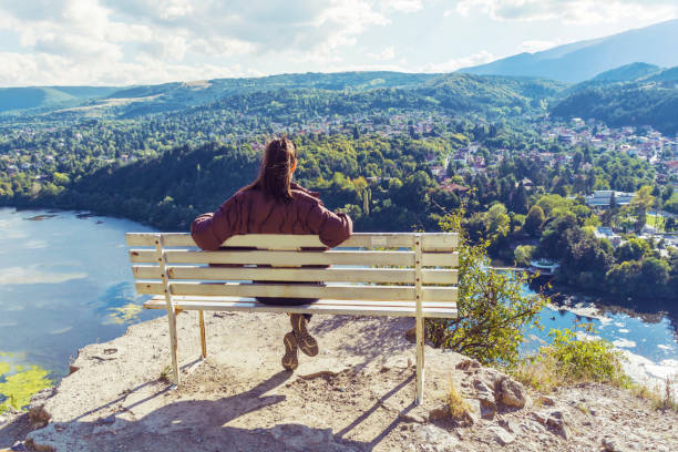 Traveler  Woman  in the summer  mountain with Lake view