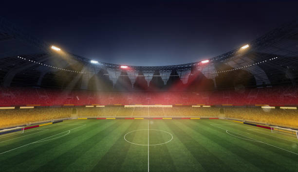 istock Empty soccer filed, stadium with spotlight and fan tribune. Germany flag attributes. 3D render. German football team 1997681434