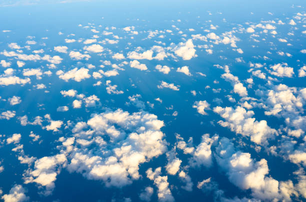 istock White Cloud and blue ocean with orange sunlight 1997695660