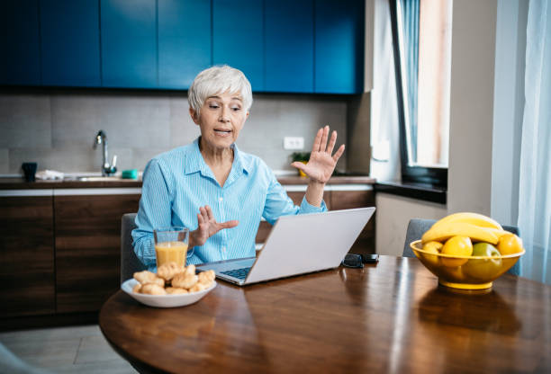 istock Senior woman working from home 1997798076